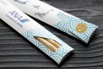 bamboo chopsticks with laser engraving in plastic-free giveaway packaging
